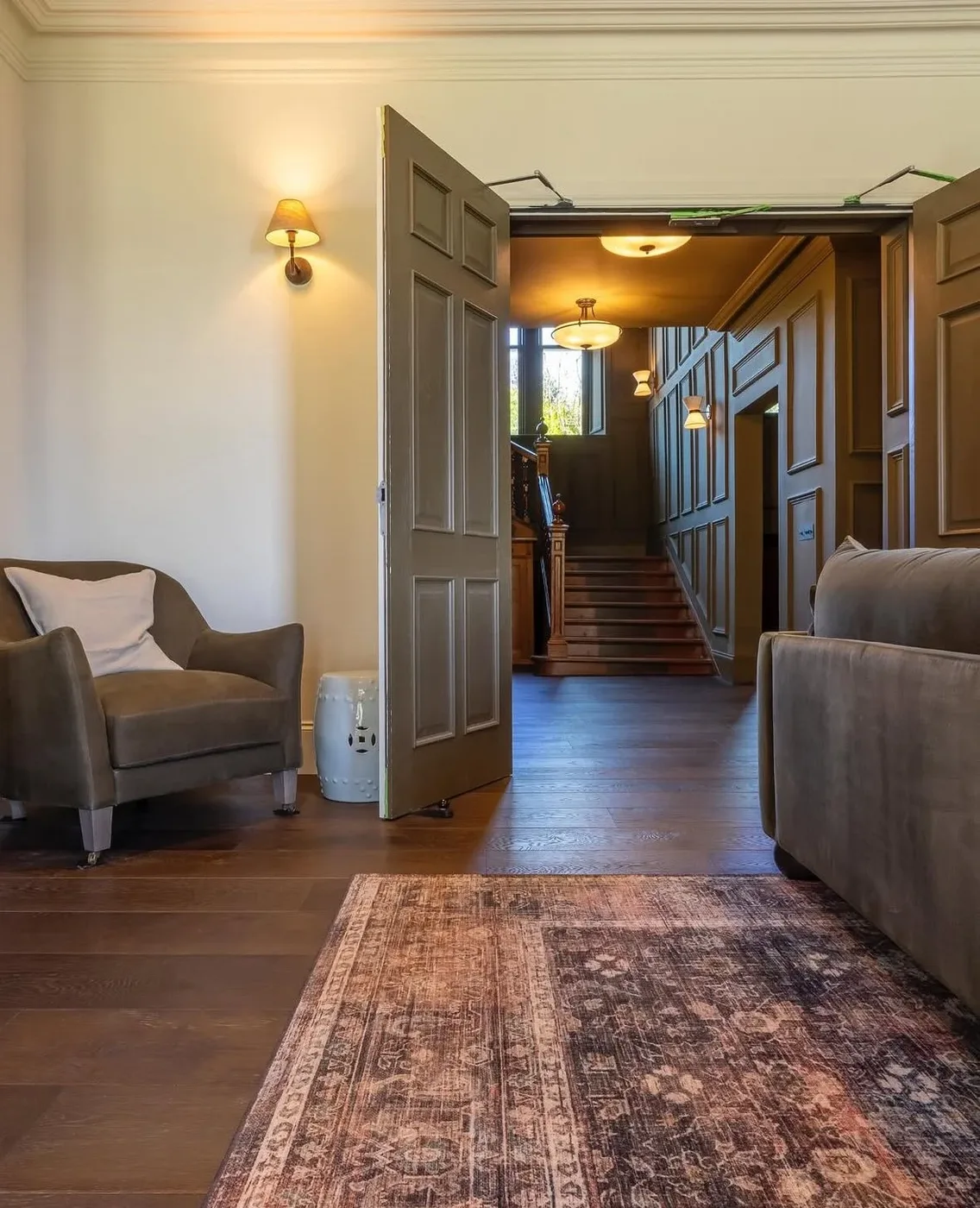 Panelled hallway leading to the staircase